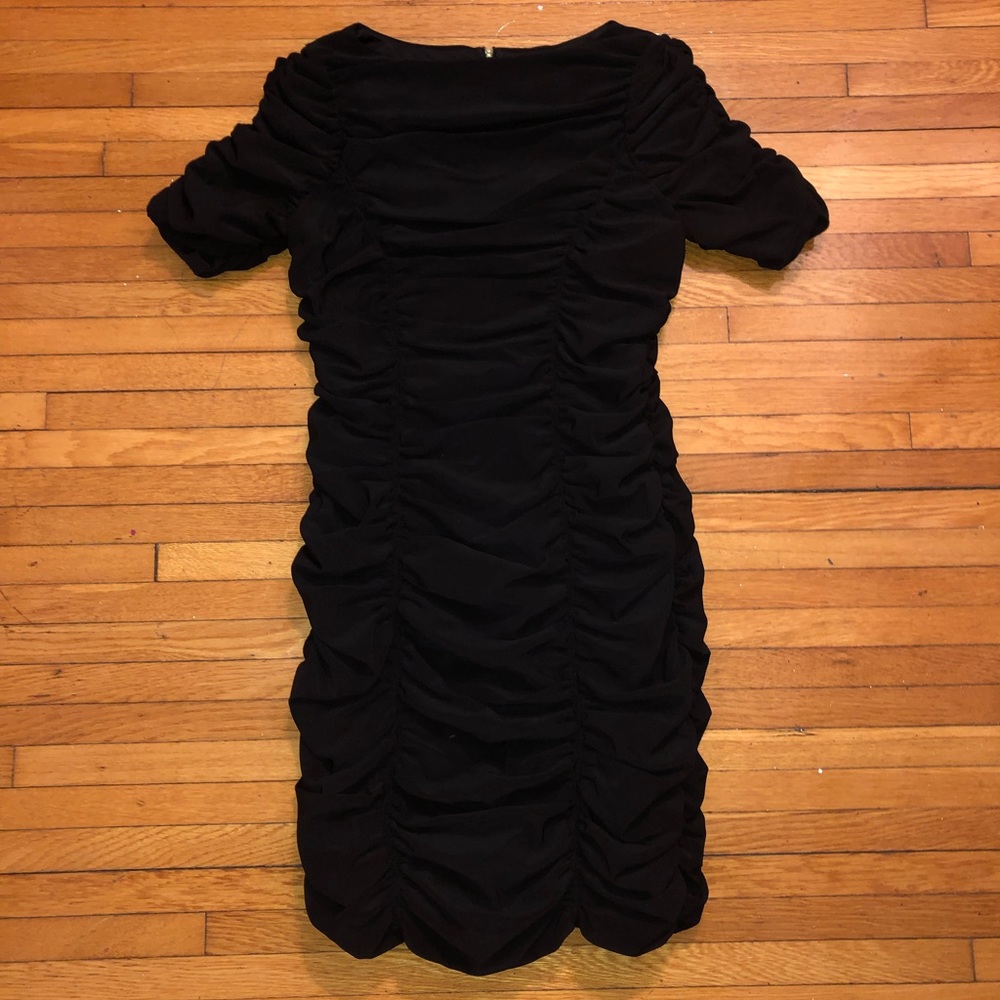 Black cocktail dress with all over ruching